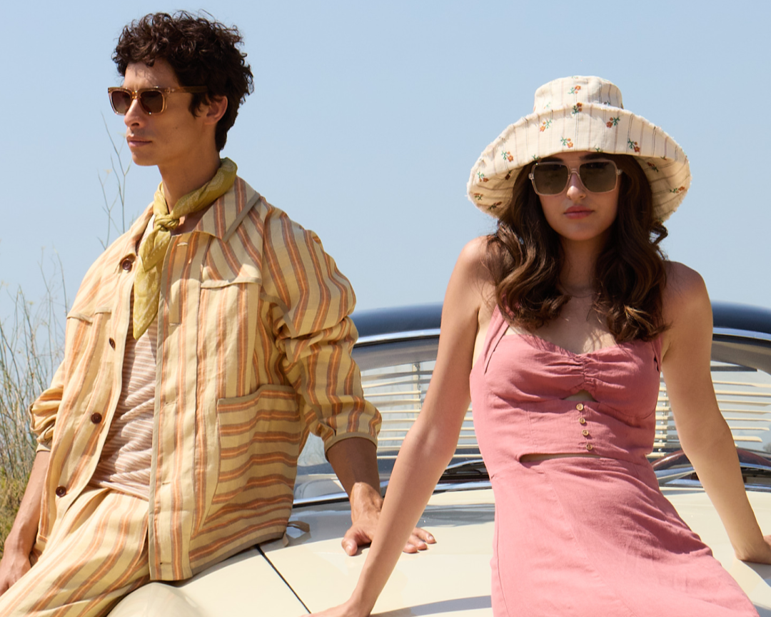 Models are wearing BARNER sunglasses on the beach